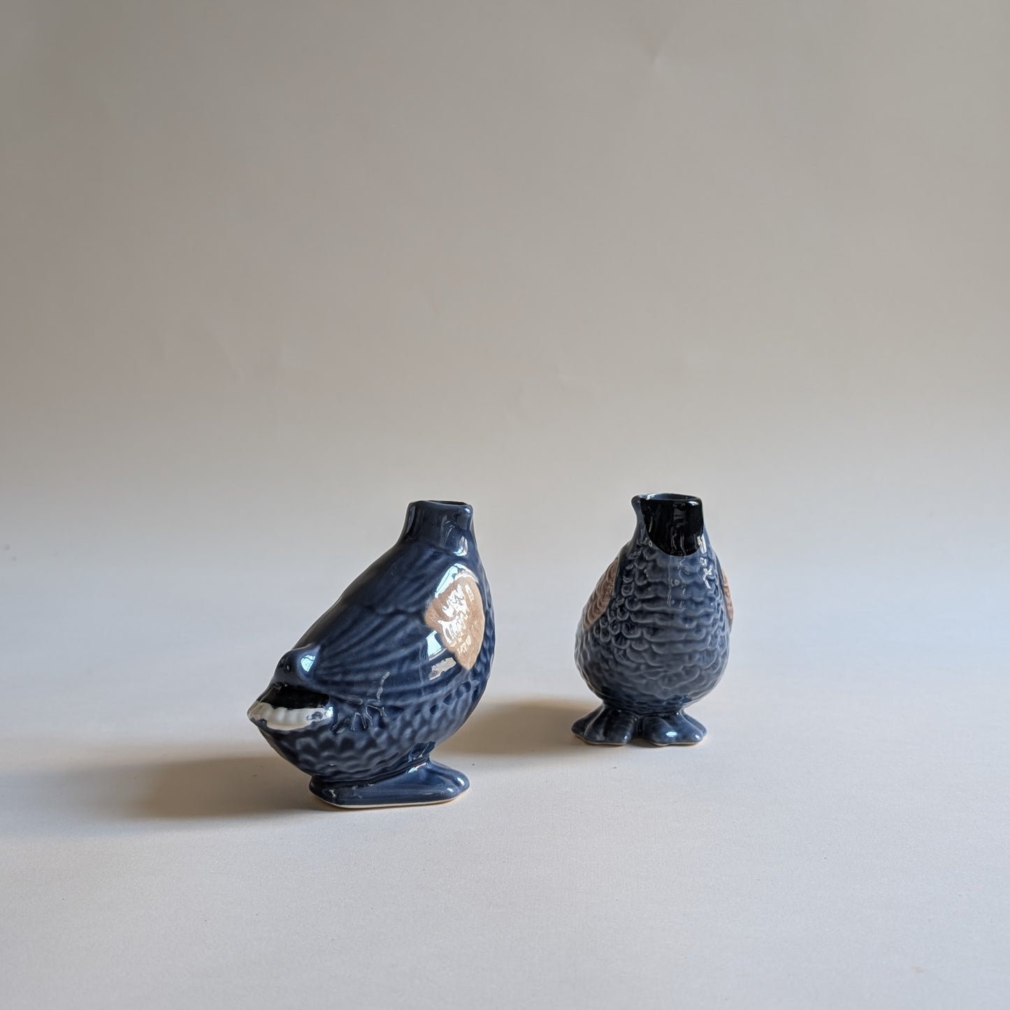 Paire de vases canards en barbotine