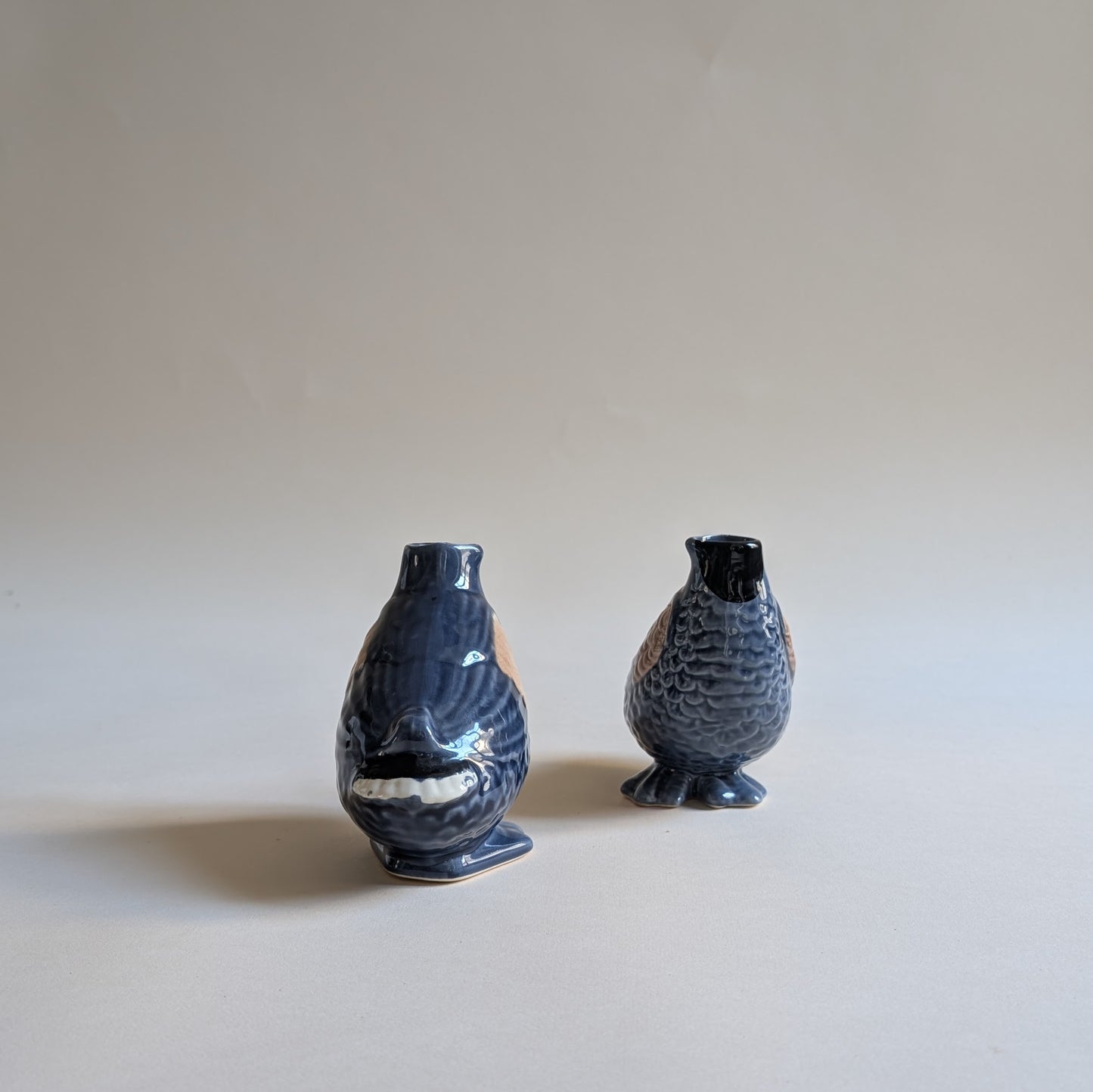 Paire de vases canards en barbotine