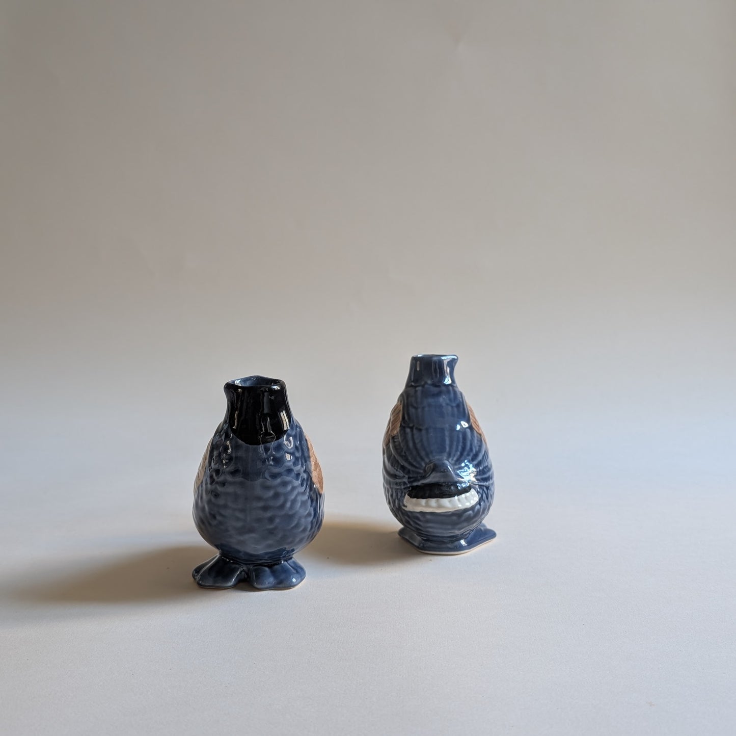 Paire de vases canards en barbotine