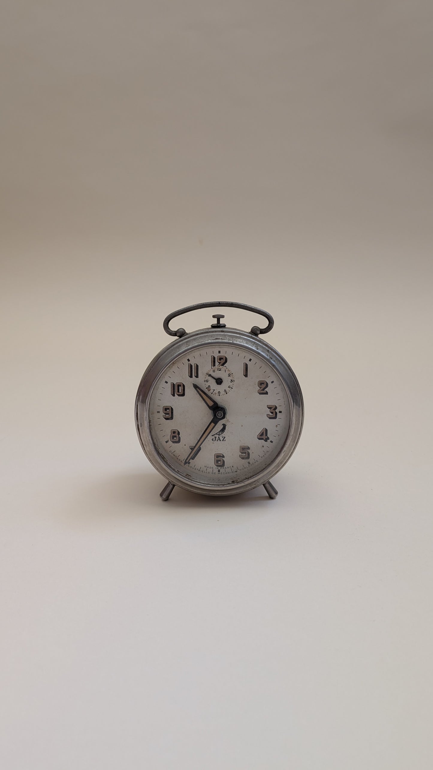 Réveil ancien en métal nickelé Jaz Modic 111 S.G.D.G