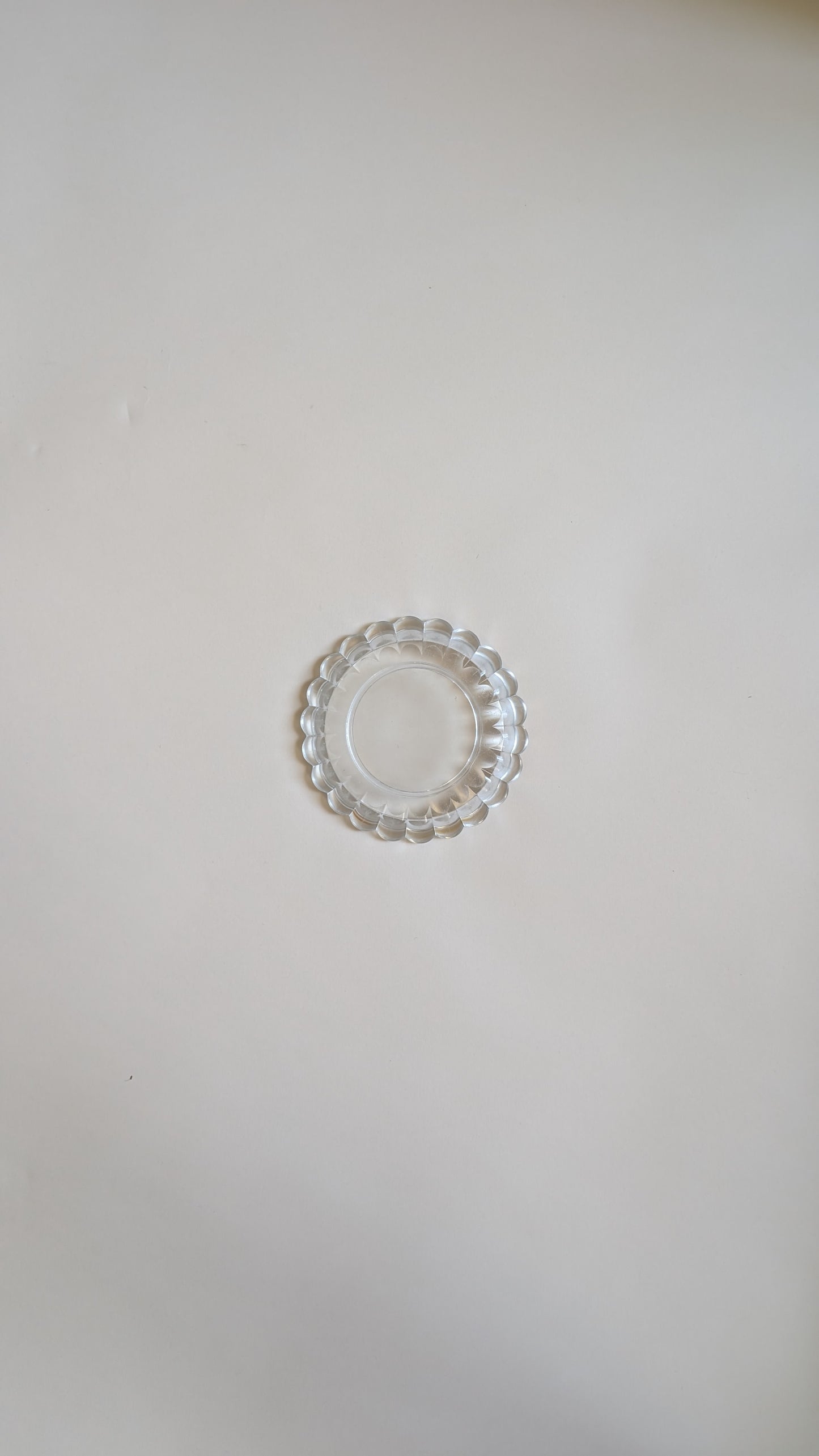 Dessous de bouteille en verre