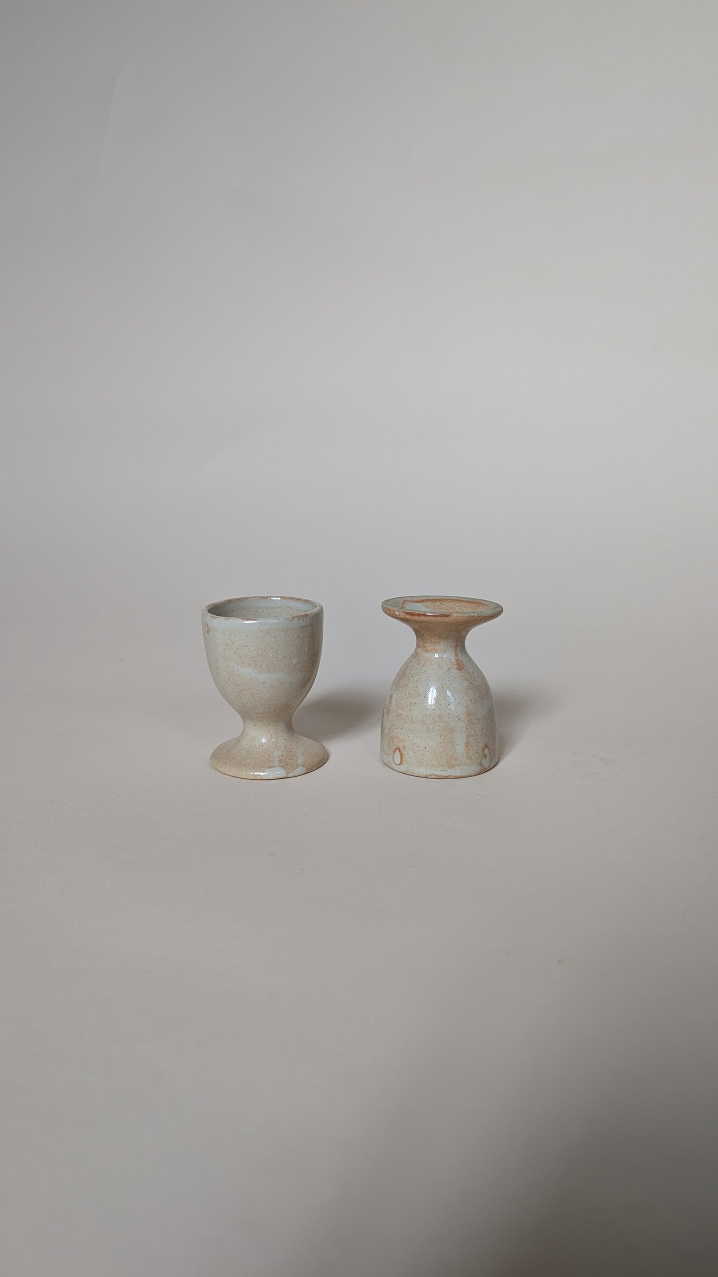 PAIRE DE COQUETIERS EN GRÈS