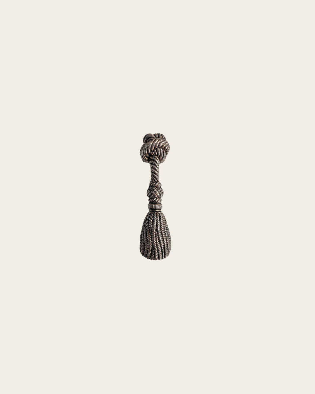 Décapsuleur vintage en métal argenté – motif pompon
