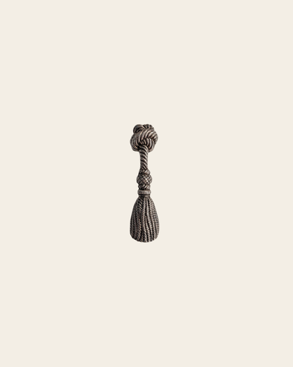 Décapsuleur vintage en métal argenté – motif pompon