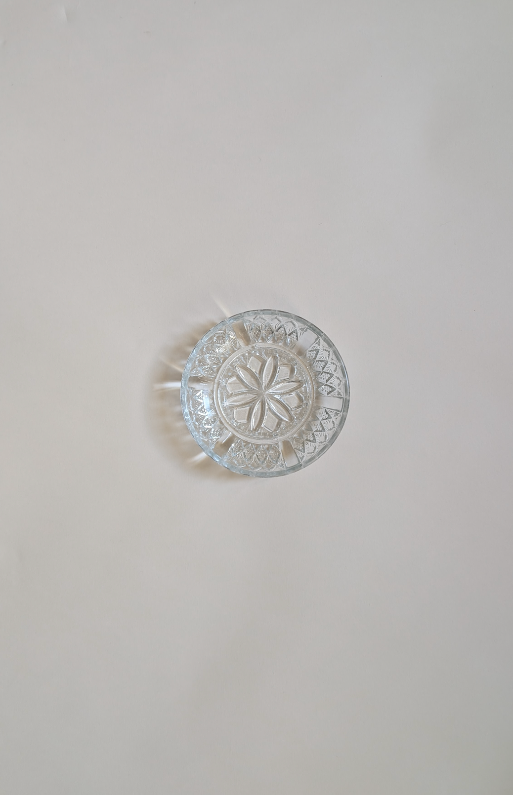 Dessous de bouteille en verre
