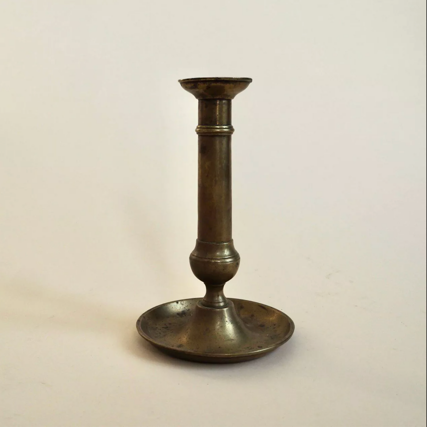 Bougeoir à pressoir en laiton