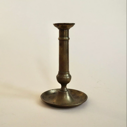 Bougeoir à pressoir en laiton