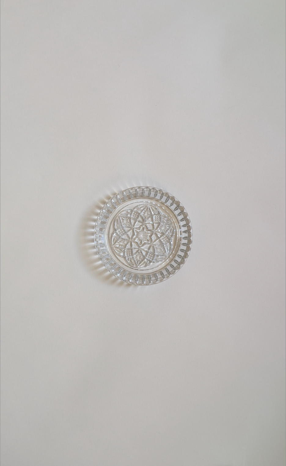 Dessous de bouteille en verre