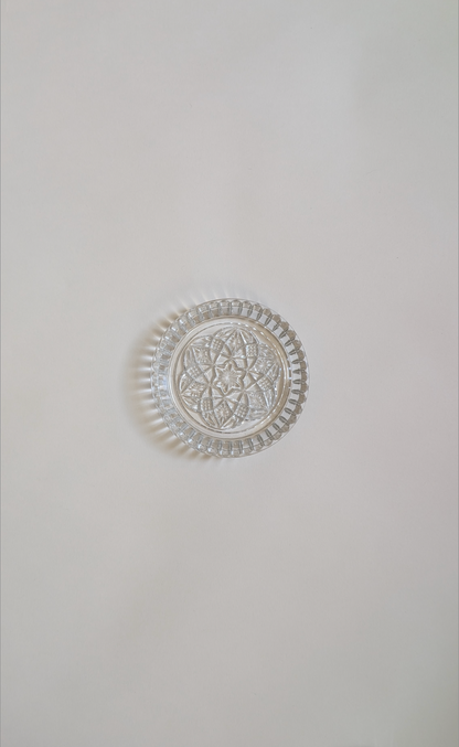 Dessous de bouteille en verre