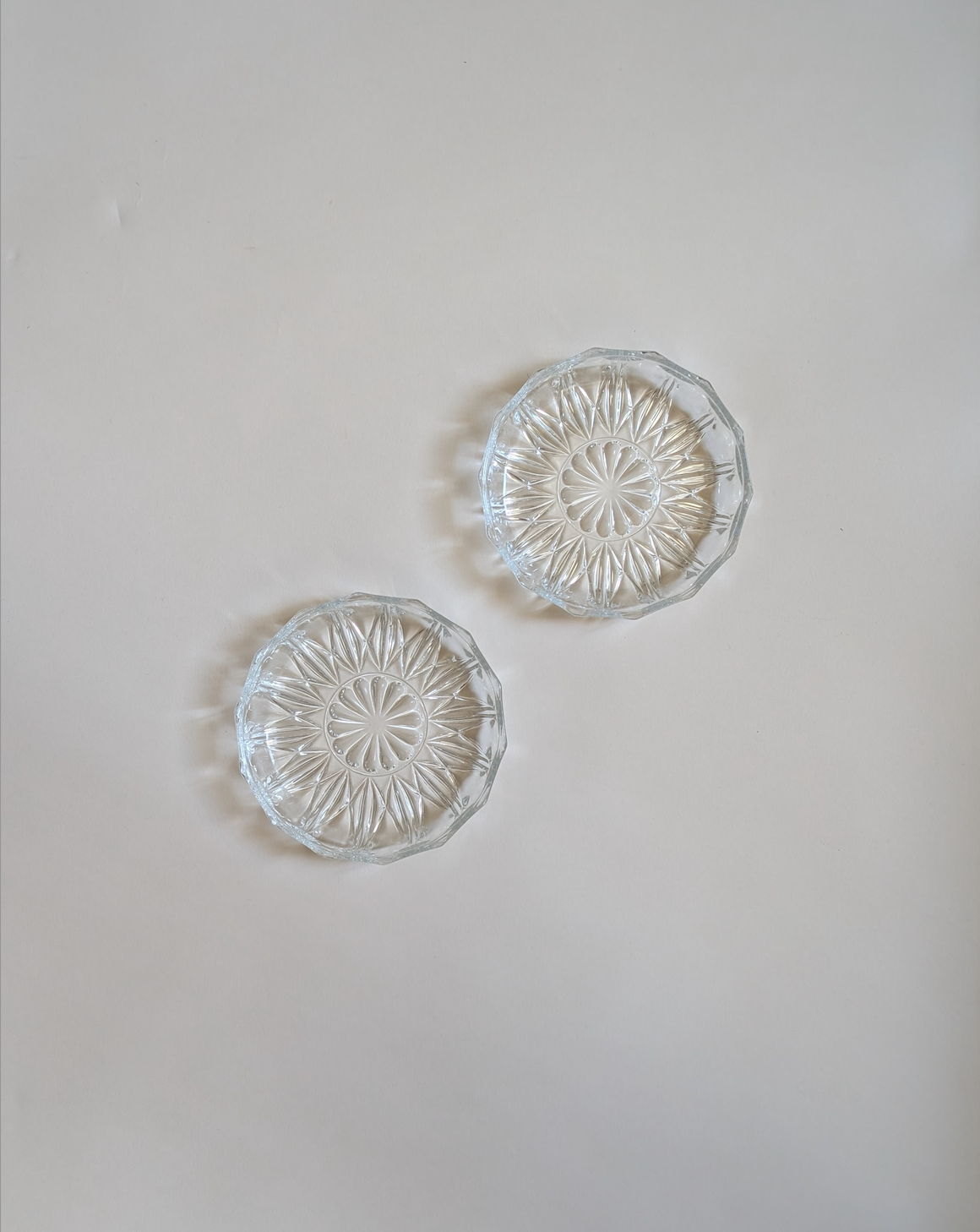 Paire de dessous de bouteille en verre