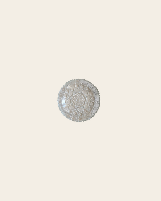 Dessous de bouteille en verre