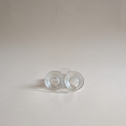 Paire de salières et poivrières en verre