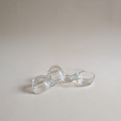 Paire de salières et poivrières en verre
