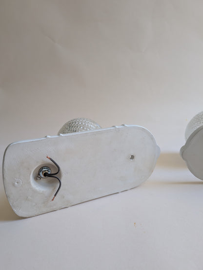 Appliques murales en céramique