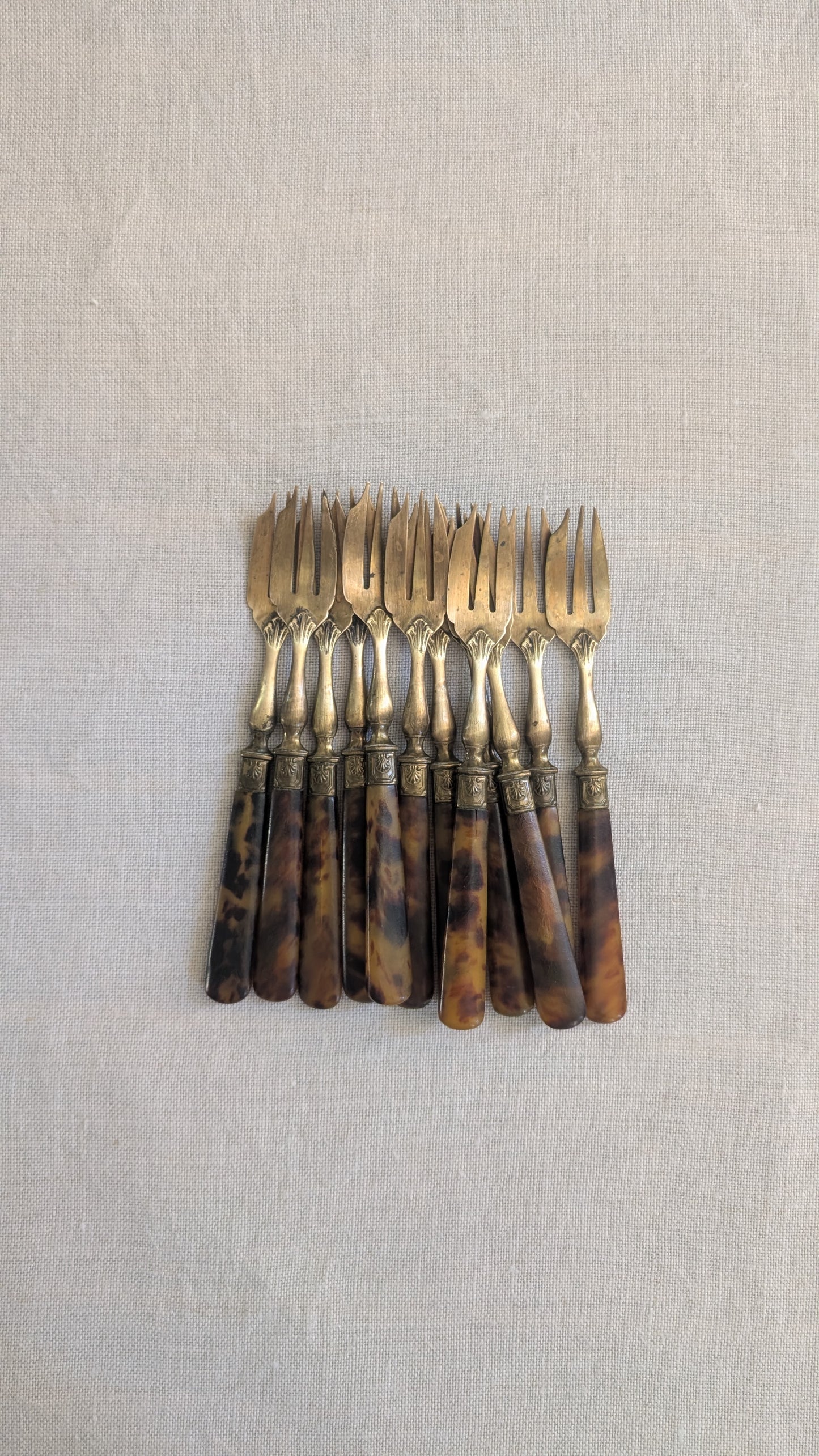 Ensemble de 12 fourchettes à gâteau anciennes