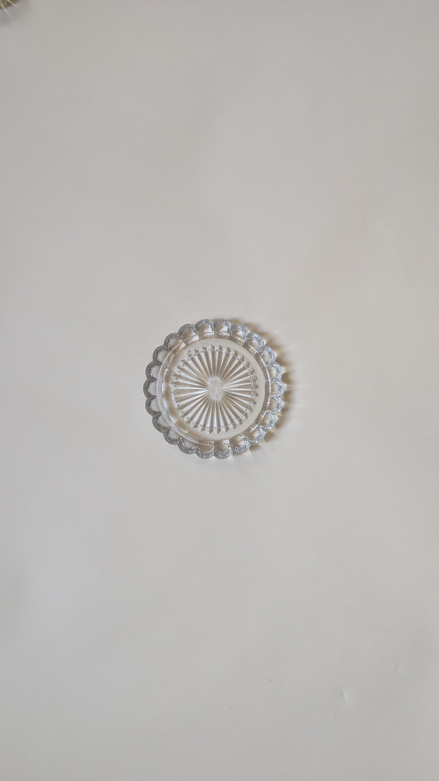 Dessous de bouteille en verre