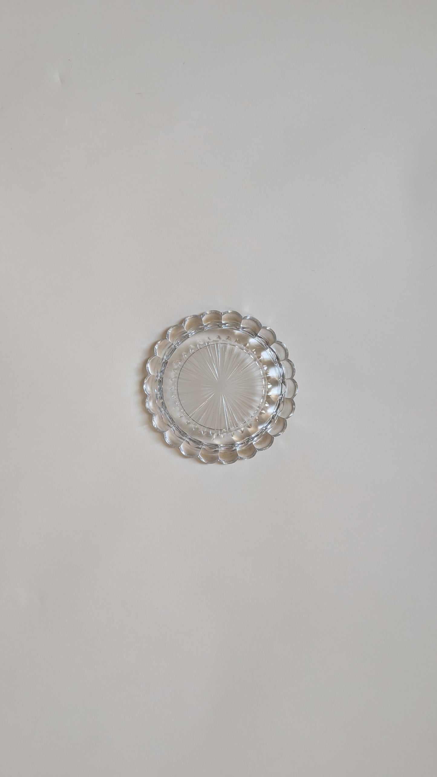 Dessous de bouteille en verre