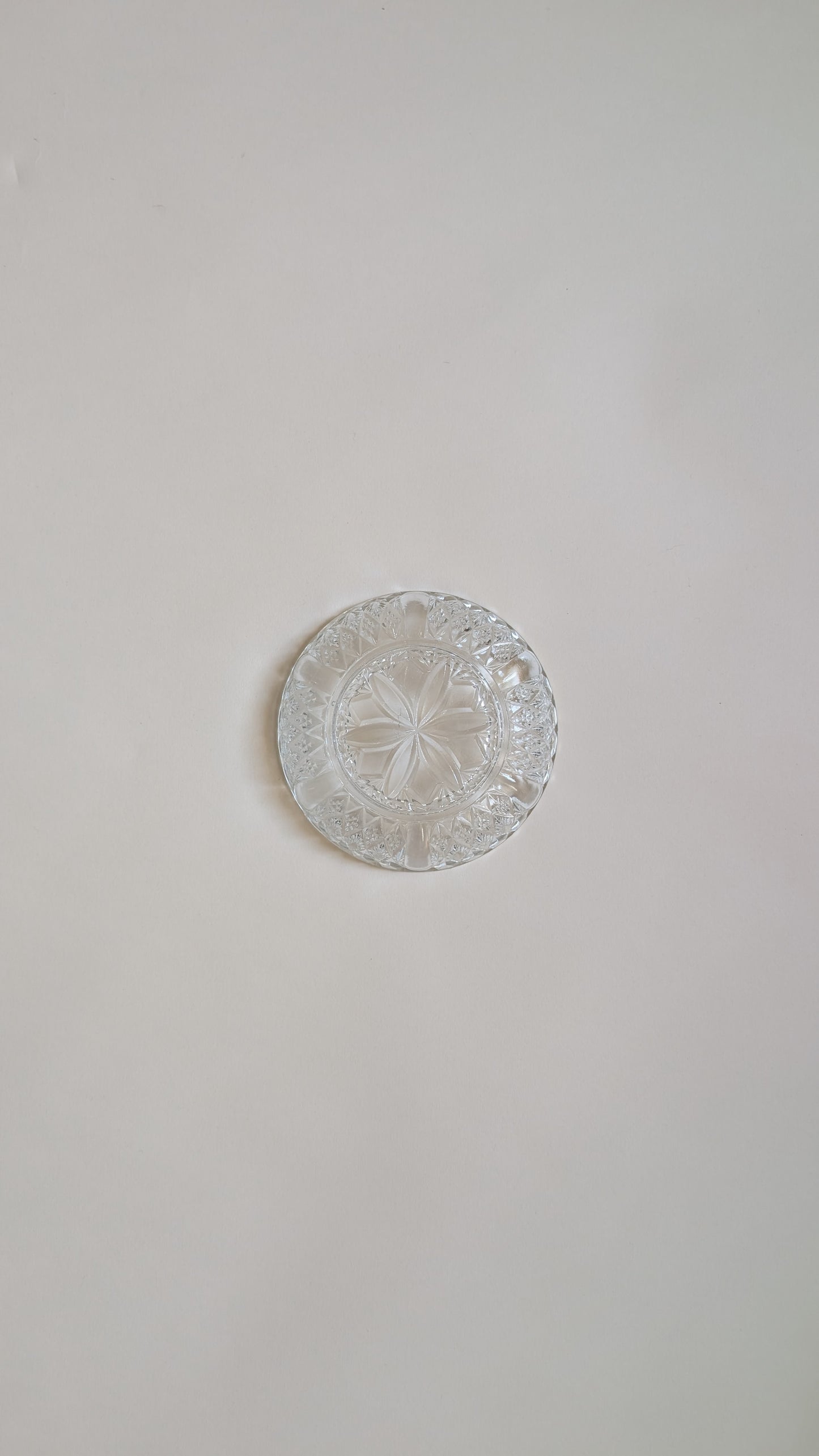 Dessous de bouteille en verre