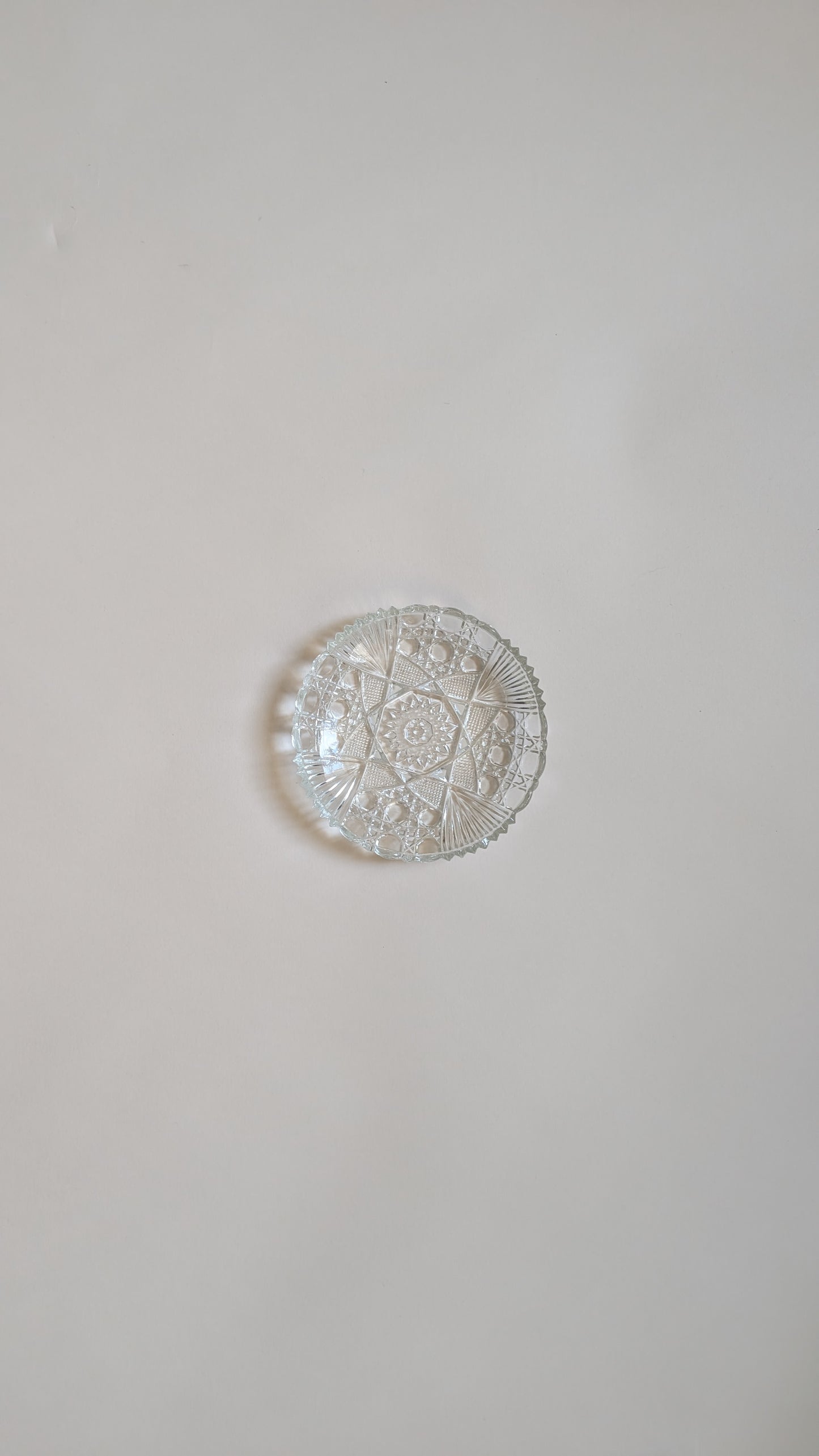 Dessous de bouteille en verre