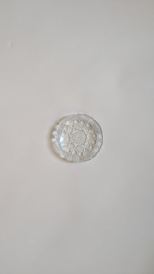Dessous de bouteille en verre