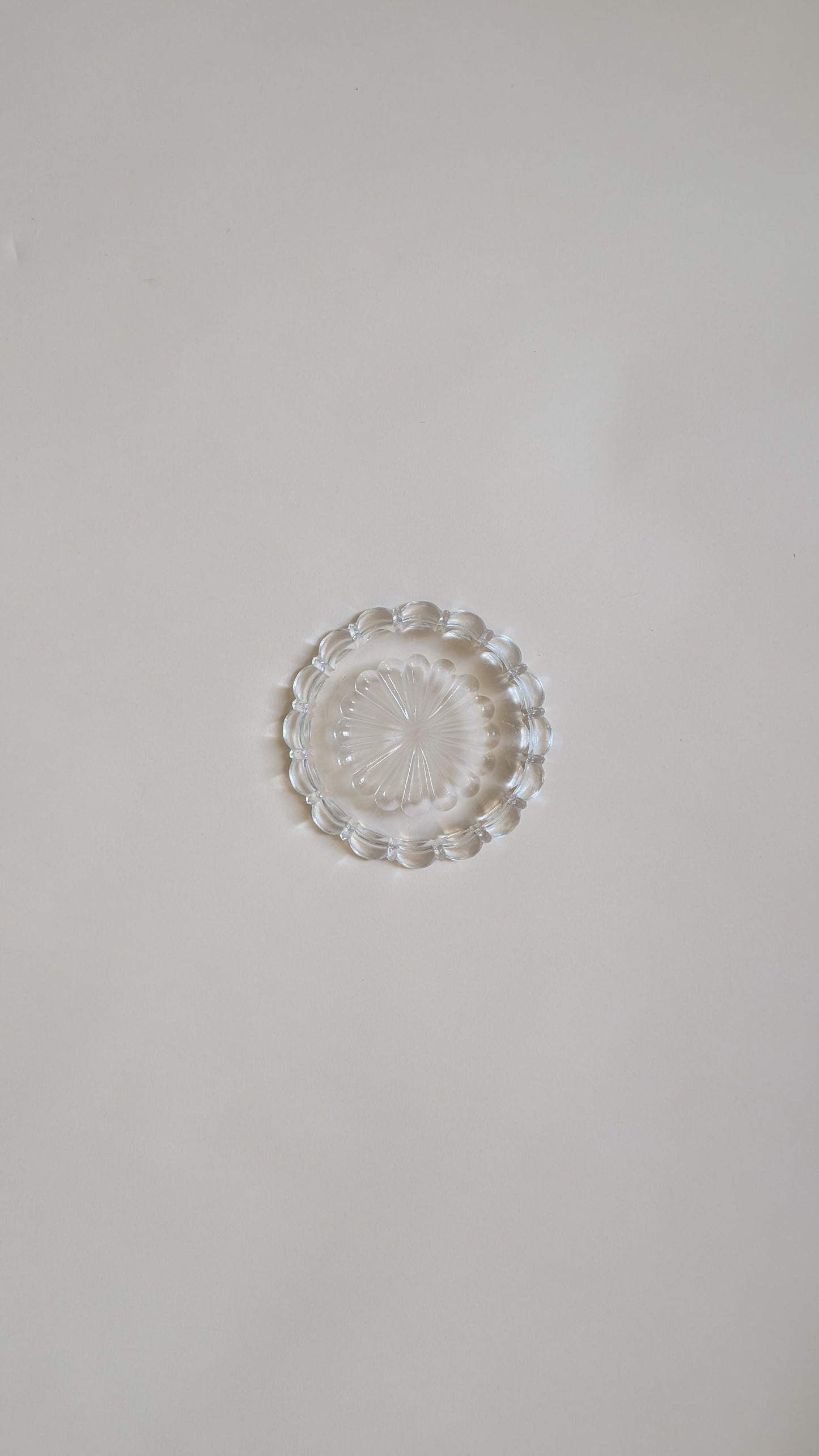 Dessous de bouteille en verre