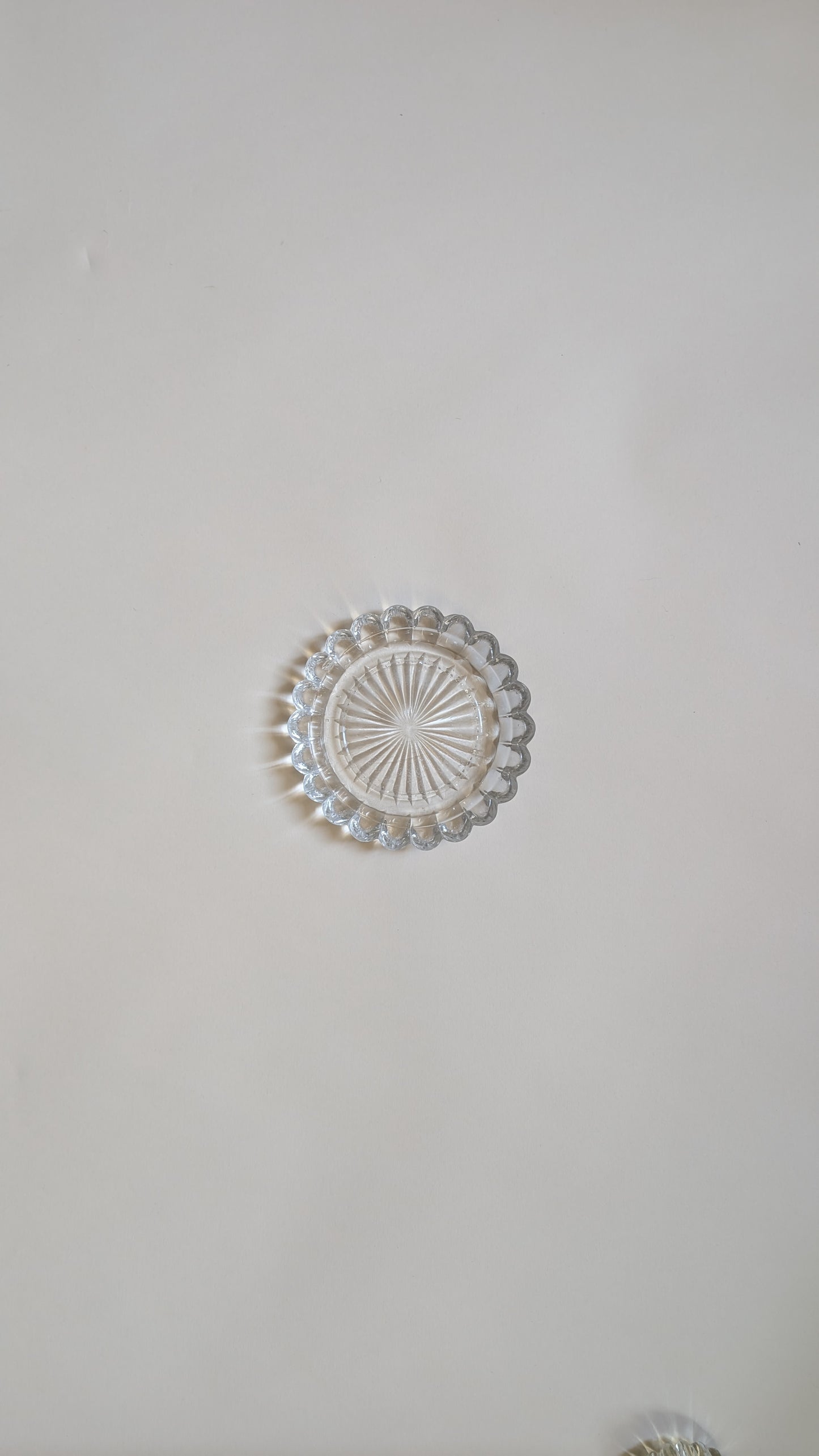 Dessous de bouteille en verre