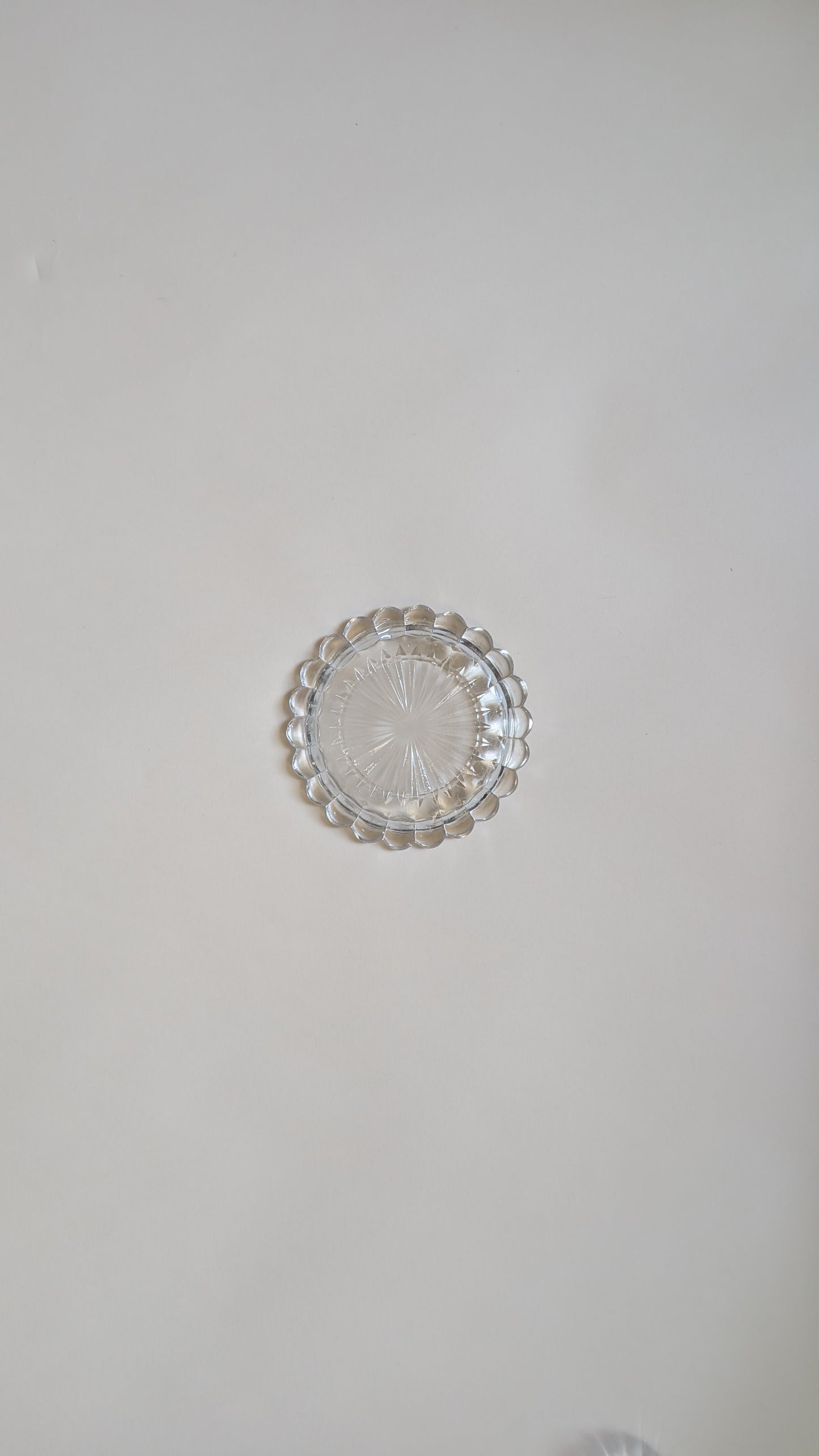 Dessous de bouteille en verre