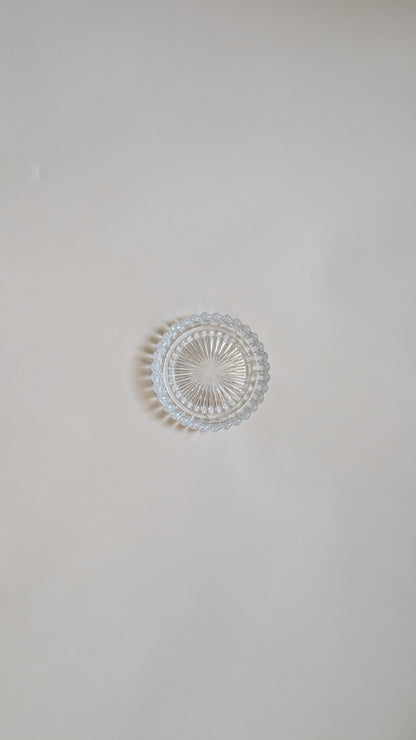 Dessous de bouteille en verre