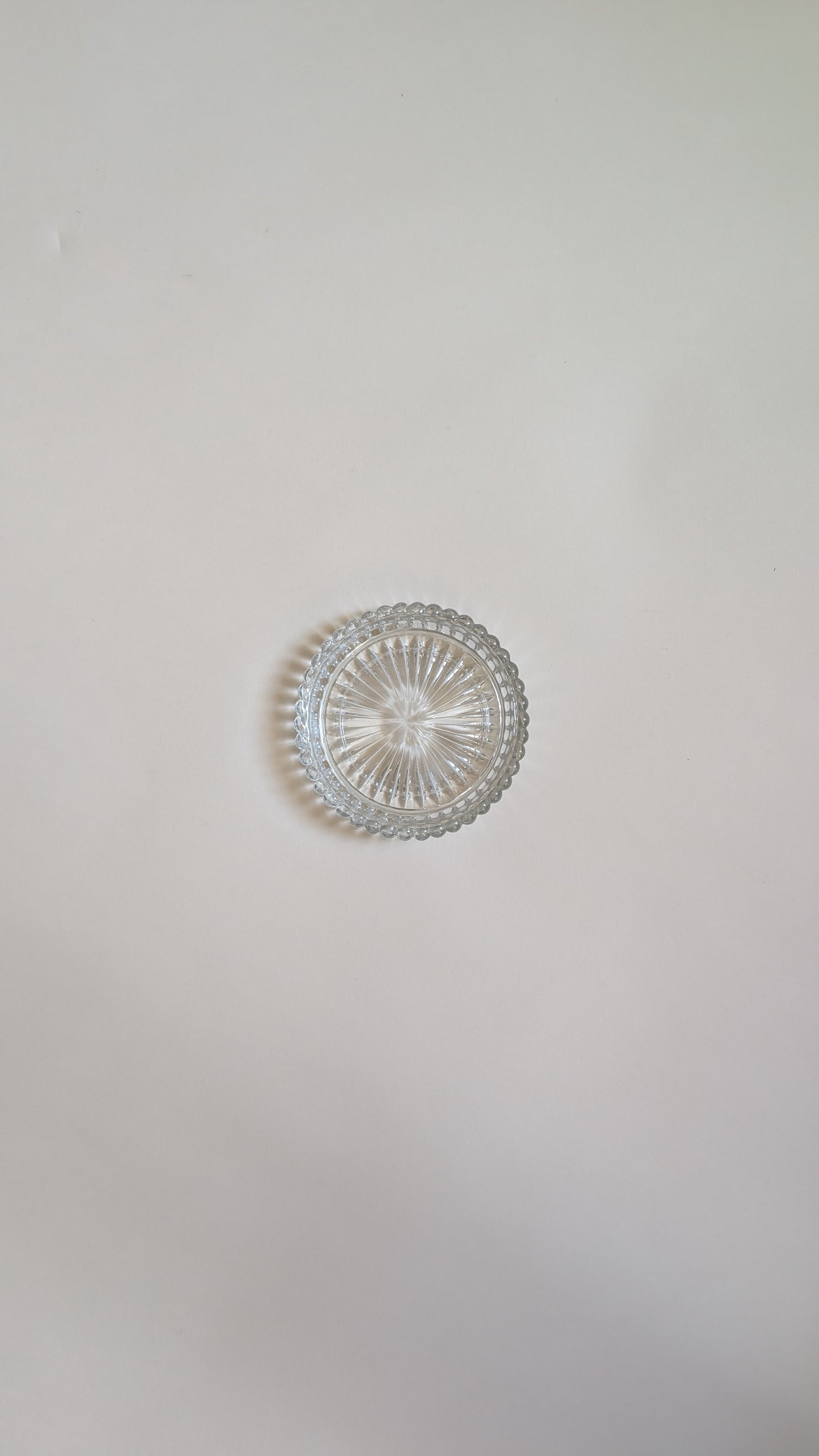 Dessous de bouteille en verre