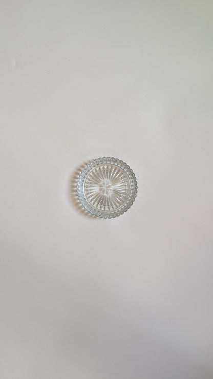 Dessous de bouteille en verre