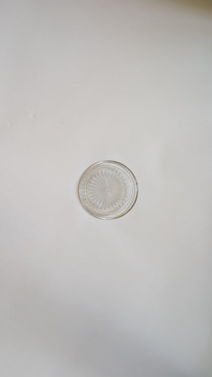 Dessous de bouteille en verre