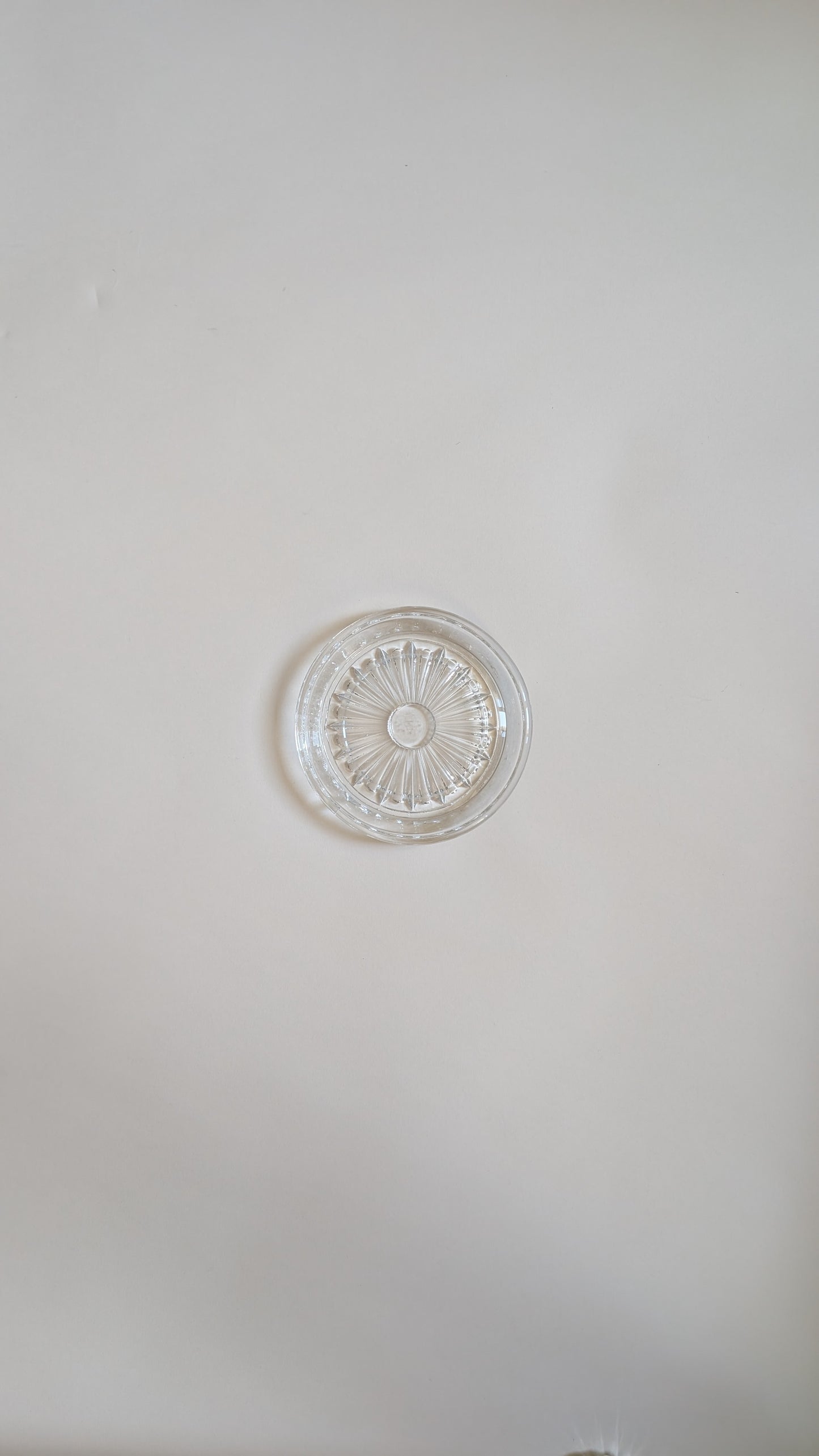 Dessous de bouteille en verre