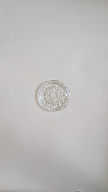 Dessous de bouteille en verre