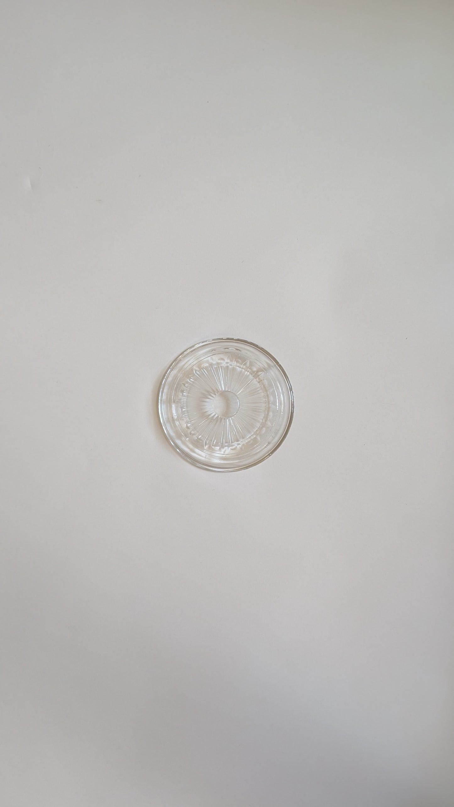 Dessous de bouteille en verre