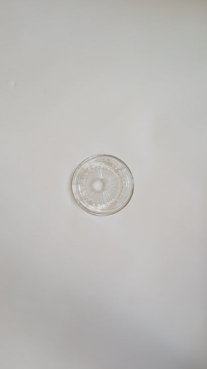 Dessous de bouteille en verre