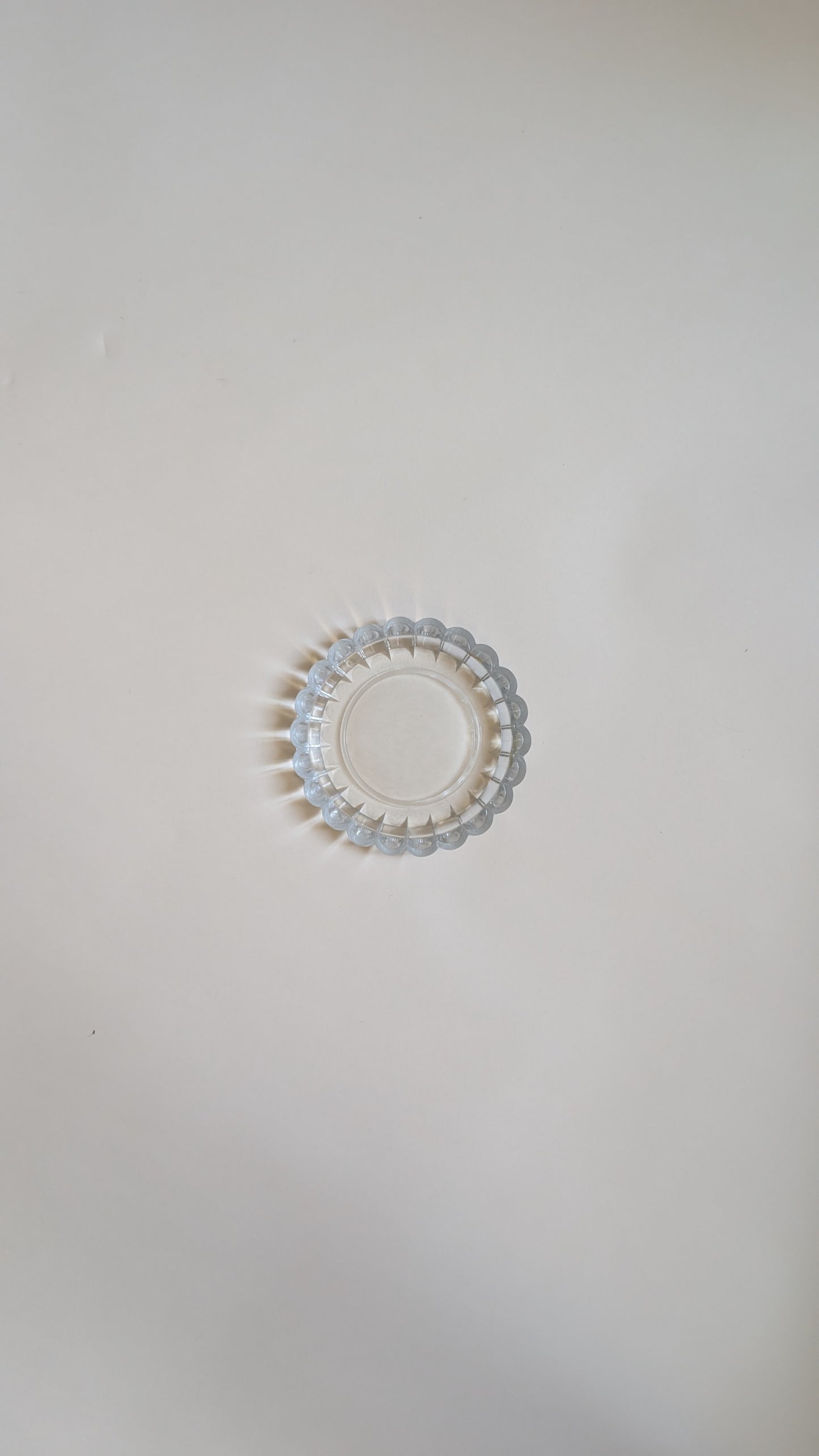 Dessous de bouteille en verre