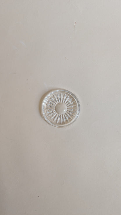 Dessous de bouteille en verre moulé