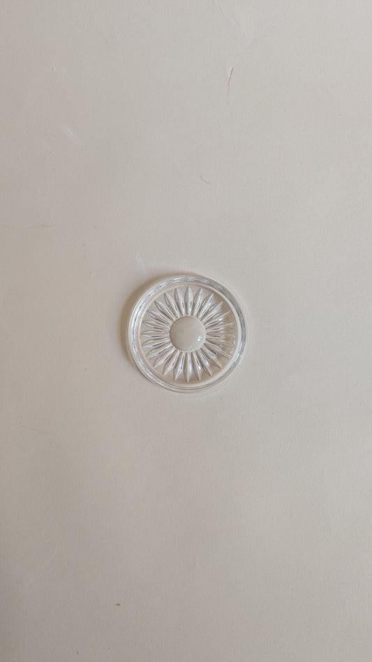 Dessous de bouteille en verre moulé