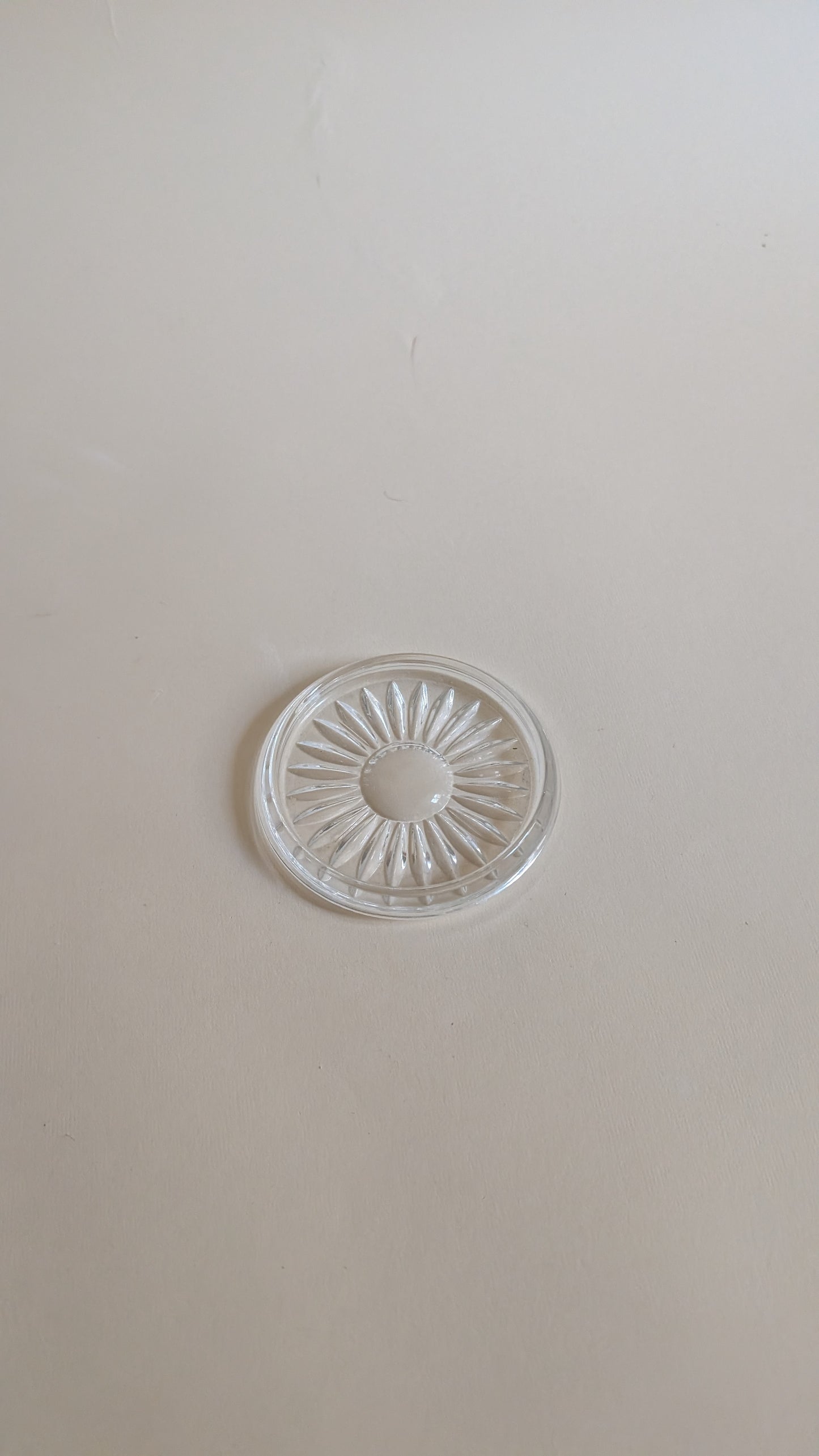 Dessous de bouteille en verre moulé