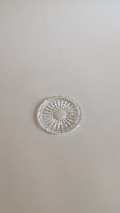 Dessous de bouteille en verre moulé