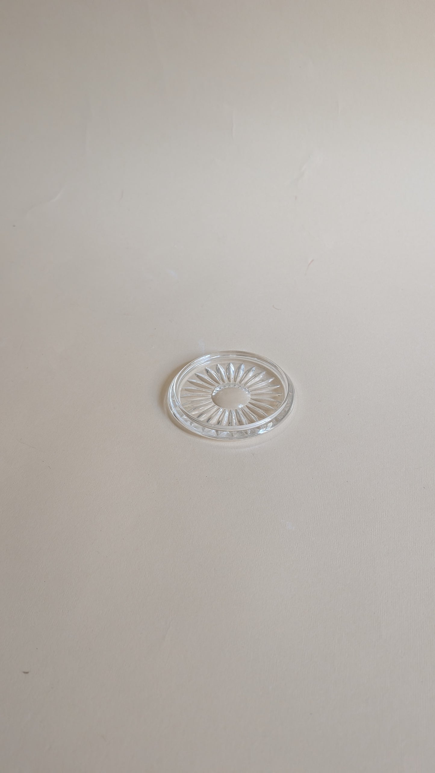 Dessous de bouteille en verre moulé