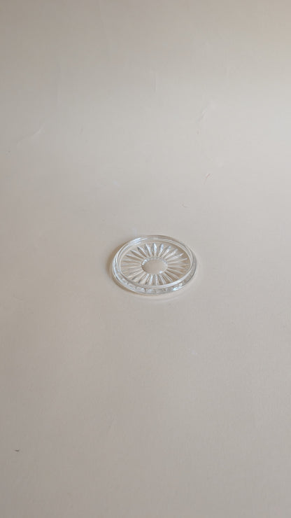 Dessous de bouteille en verre moulé