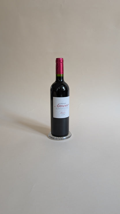Dessous de bouteille en verre moulé