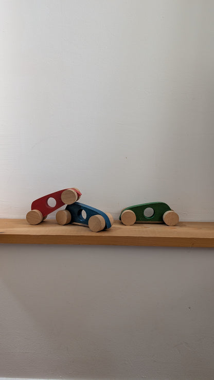 Trio de voitures de course vintage en bois