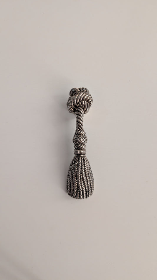 Décapsuleur vintage en métal argenté – motif pompon